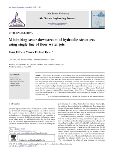 Minimizing scour downstream of hydraulic structures using single line of floor water jets